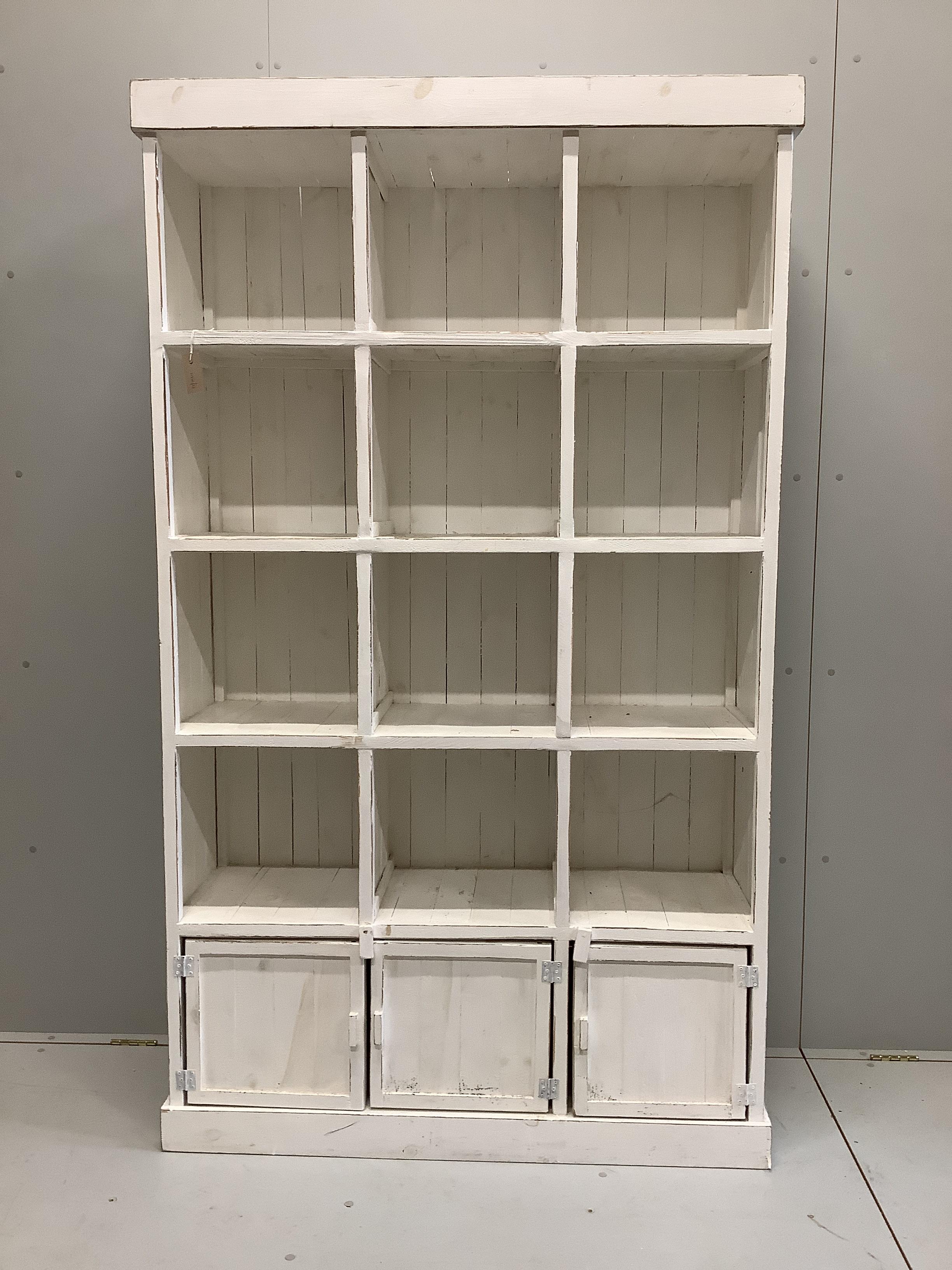 A painted pine pigeonhole unit, width 119cm, depth 39cm, height 201cm